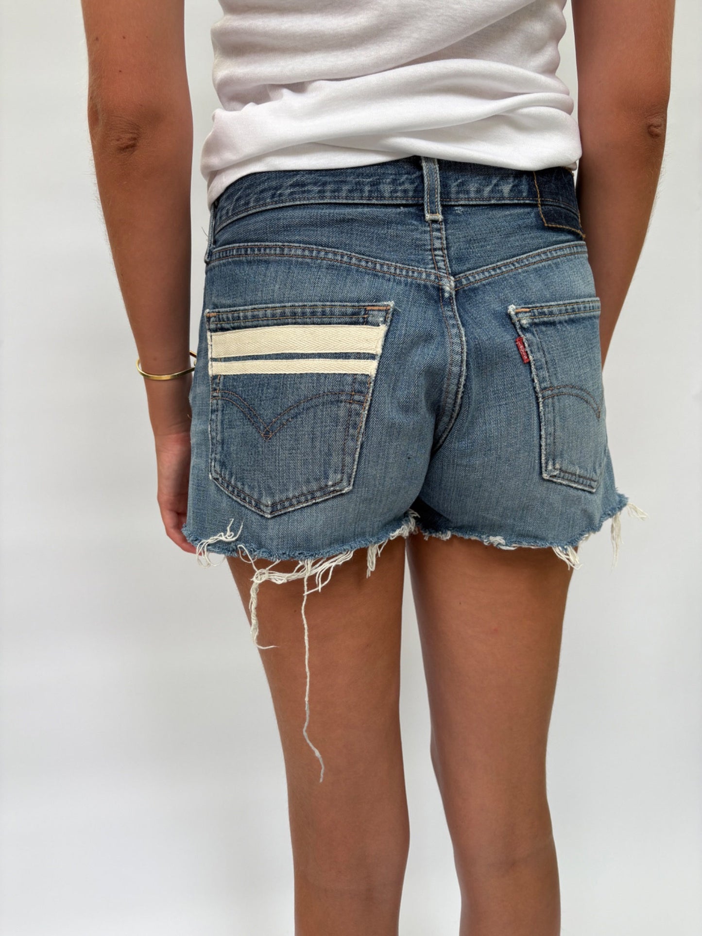 049. Levi's Cut Offs White Tape