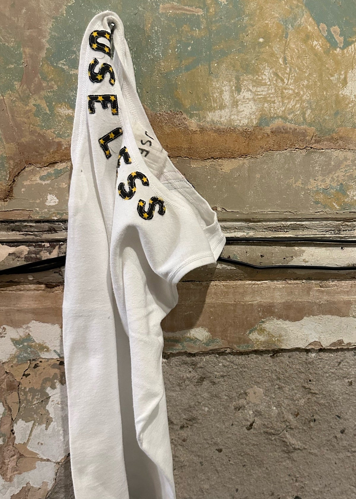 001. White Tank Appliqué Logo