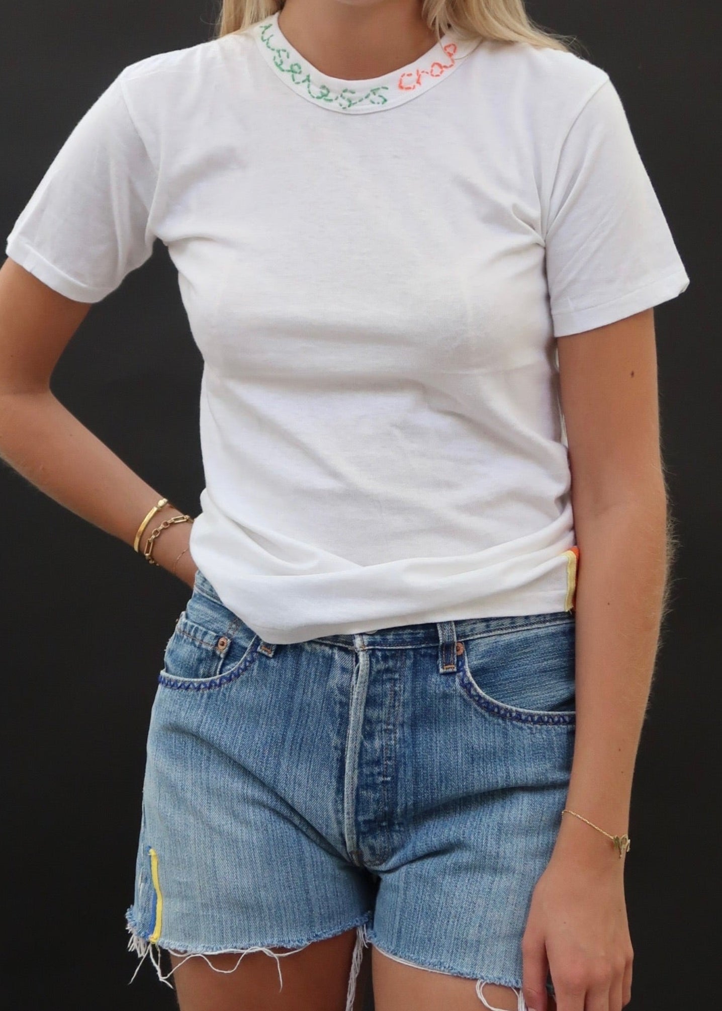 White T Shirt with Green and Orange Embroidery