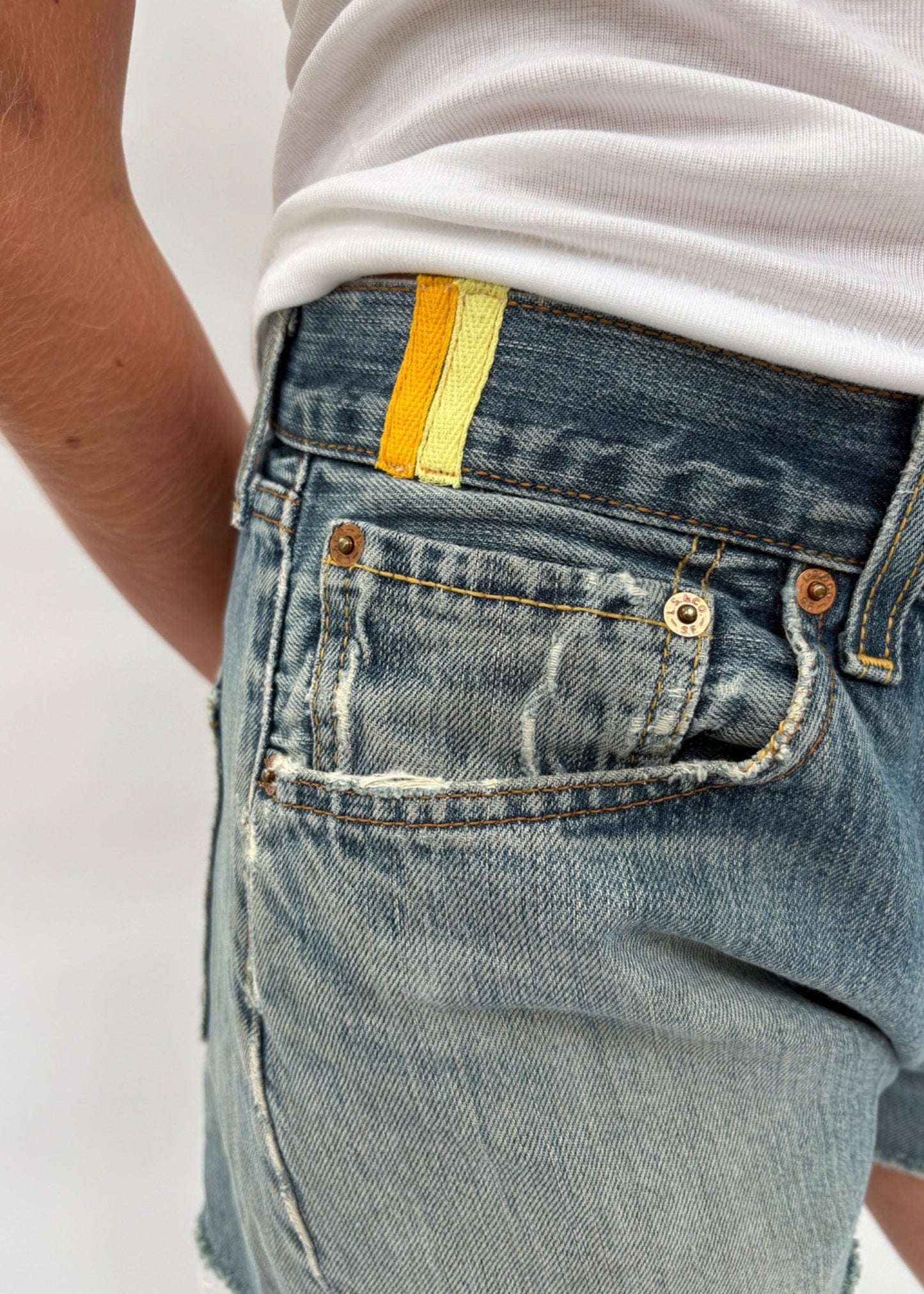 046. Levi's Cut Offs Red Tape