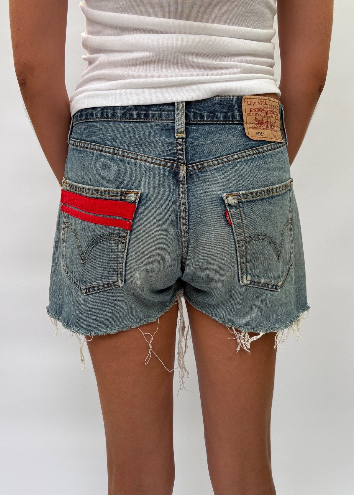 046. Levi's Cut Offs Red Tape