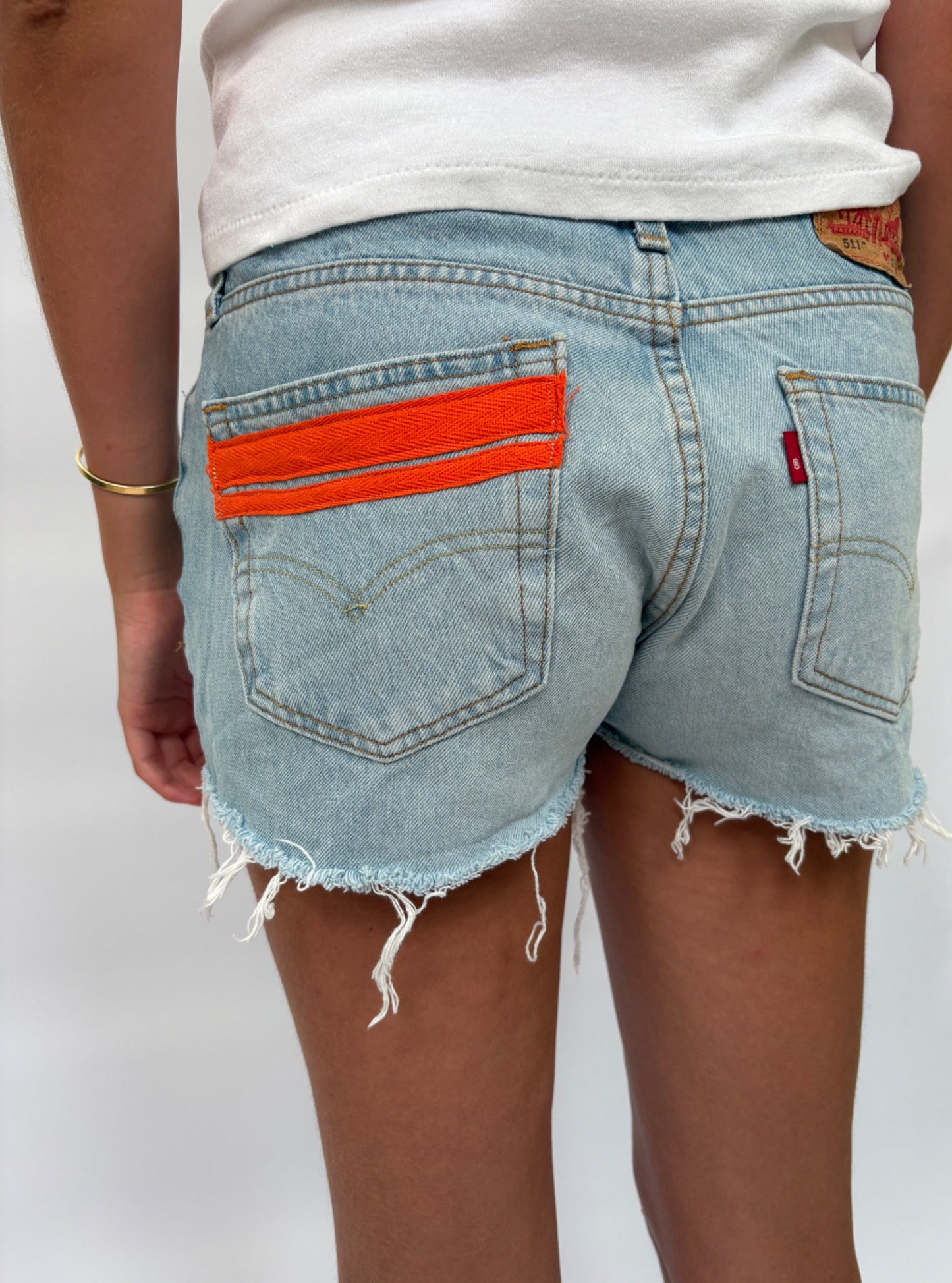 049. Pale Levi's Cut Offs Orange Tape