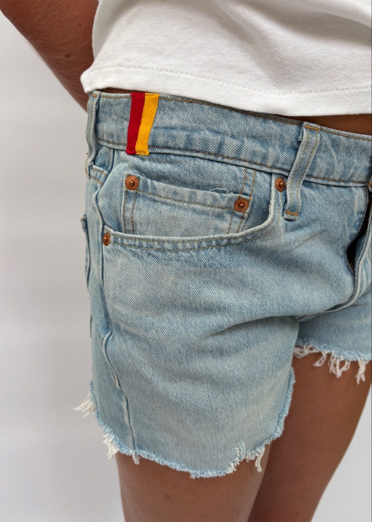 049. Pale Levi's Cut Offs Orange Tape