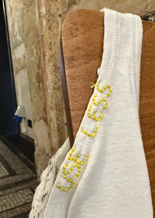 009. White Tank Neckline Logo Yellow