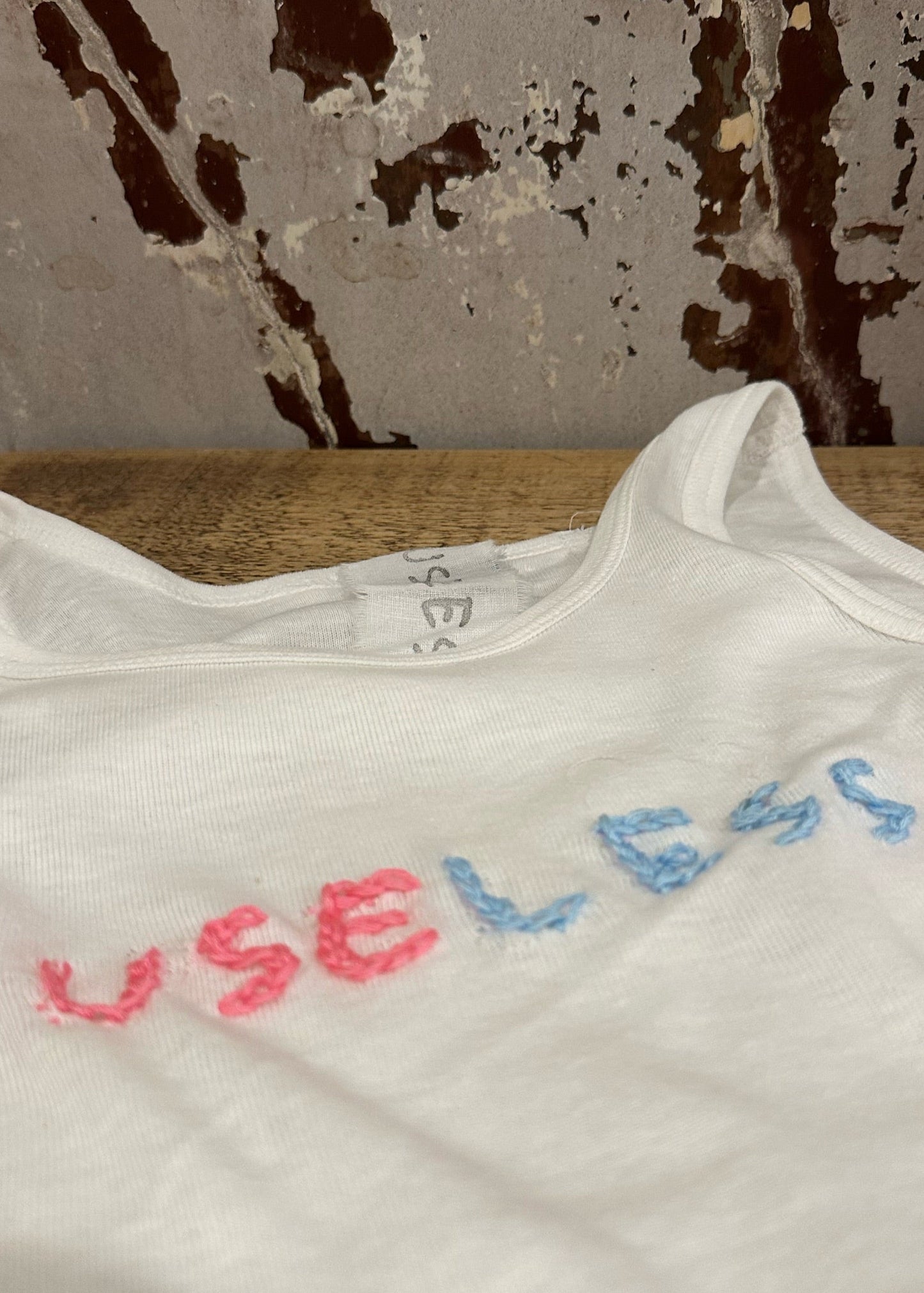 007. White Tank Chest Stitch Logo