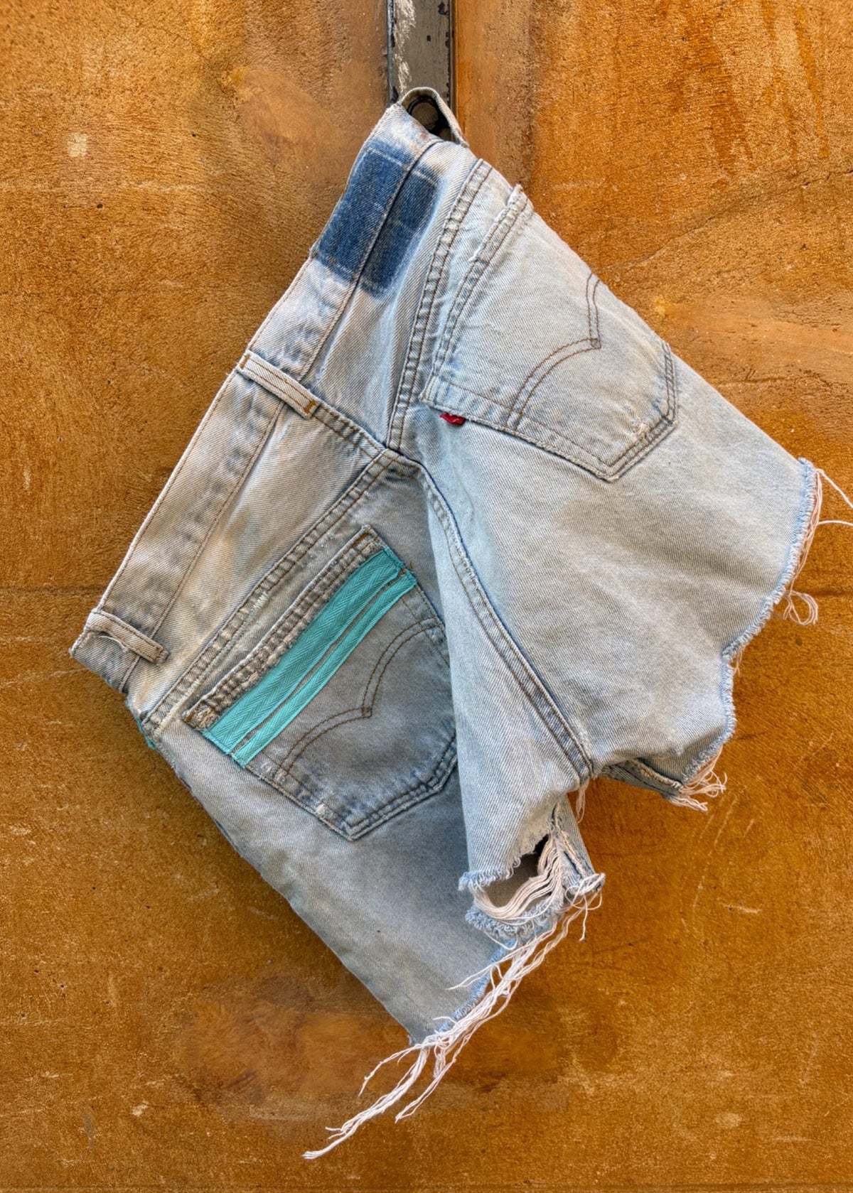 034. Levi's Cut Offs Blue Tape