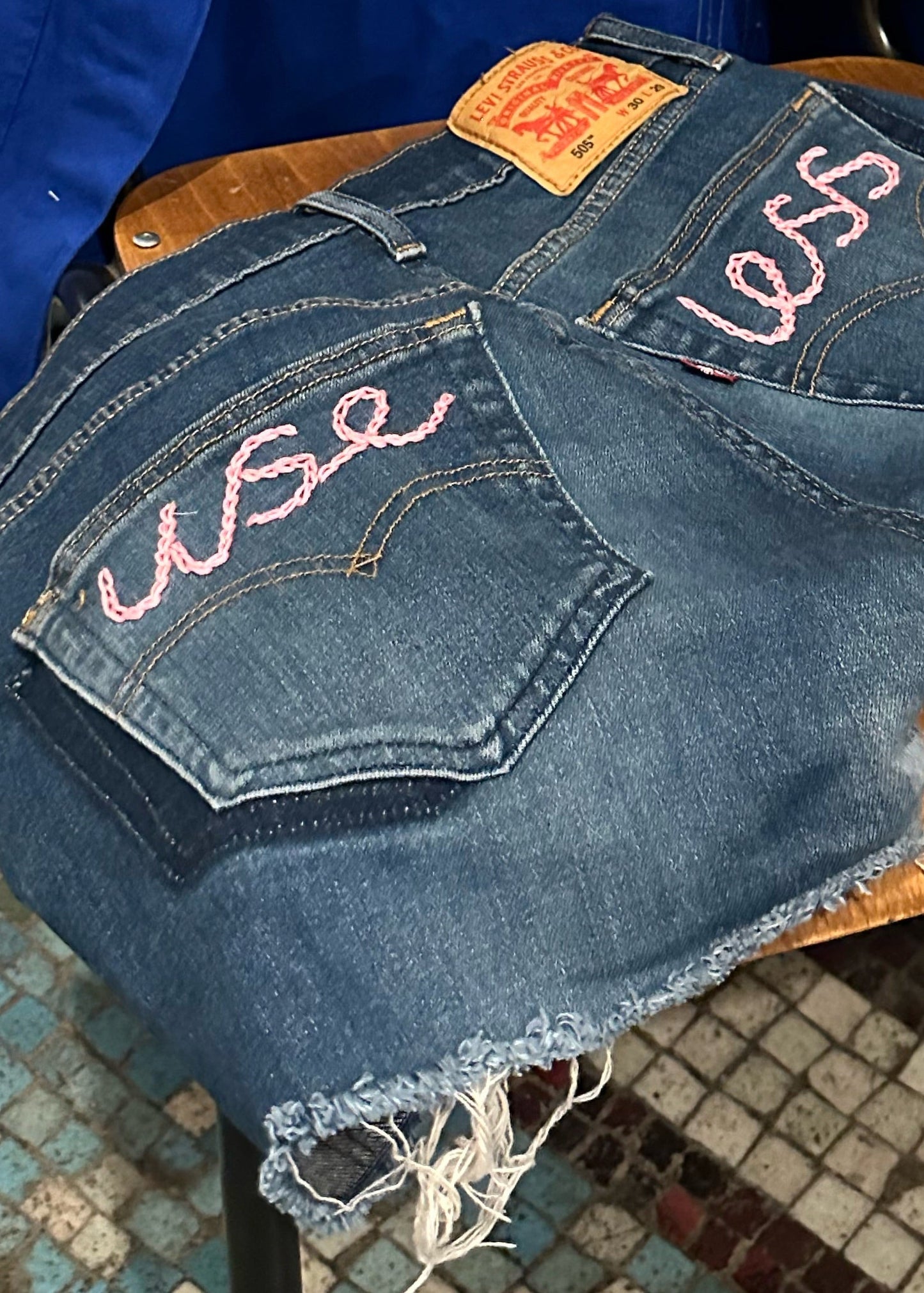 017. Levi's Cut Offs With Chain Stitch