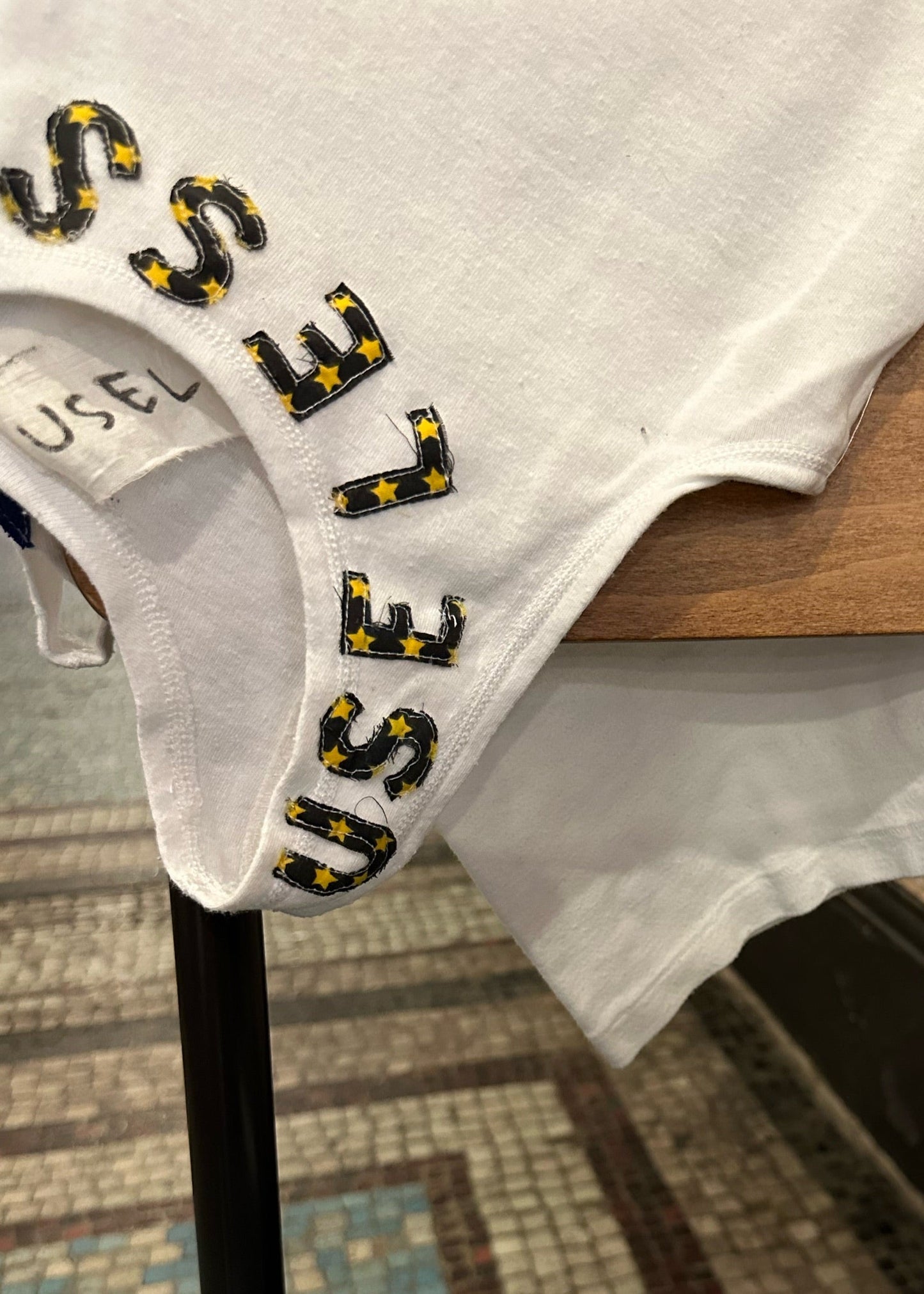 001. White Tank Appliqué Logo