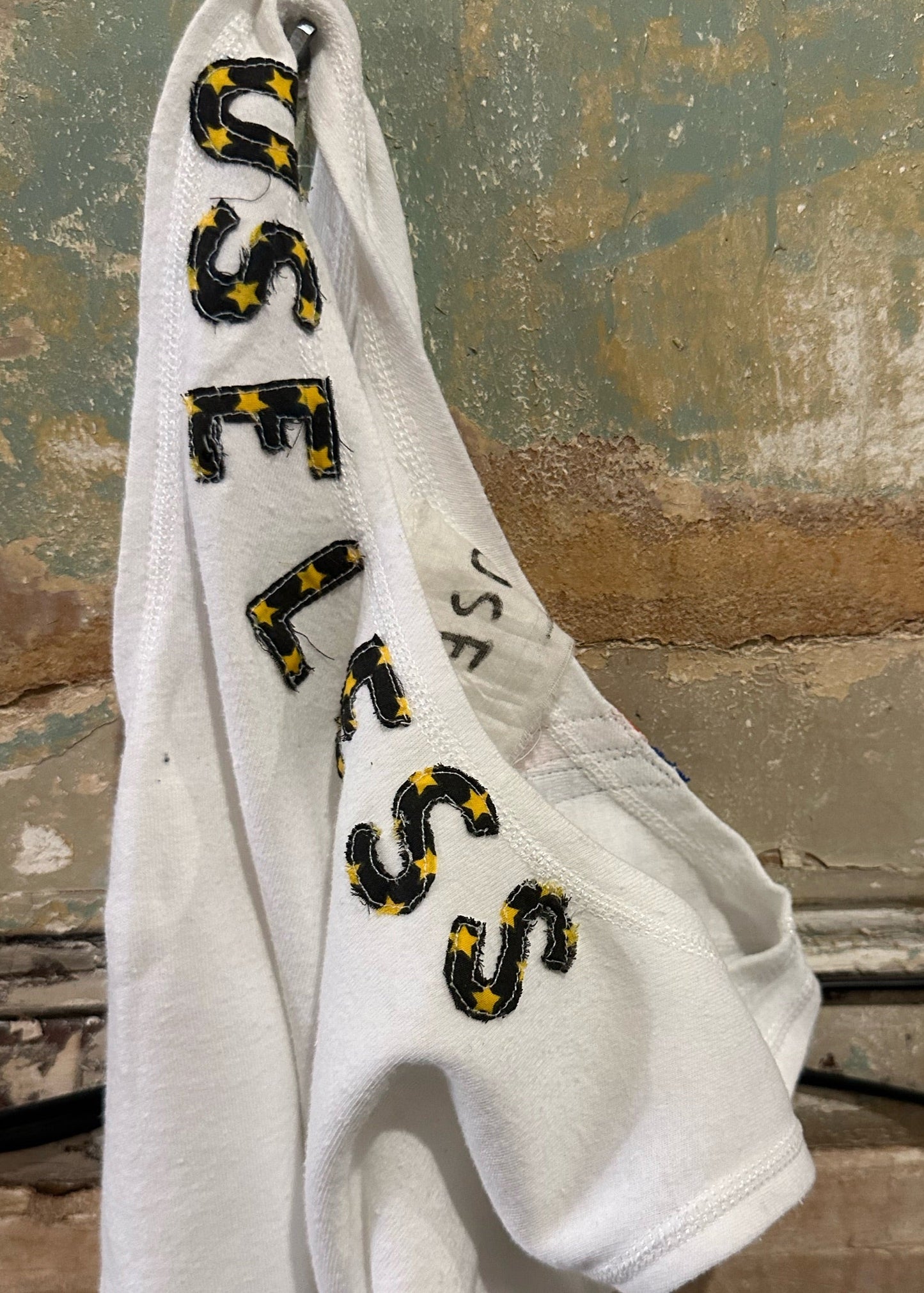 001. White Tank Appliqué Logo