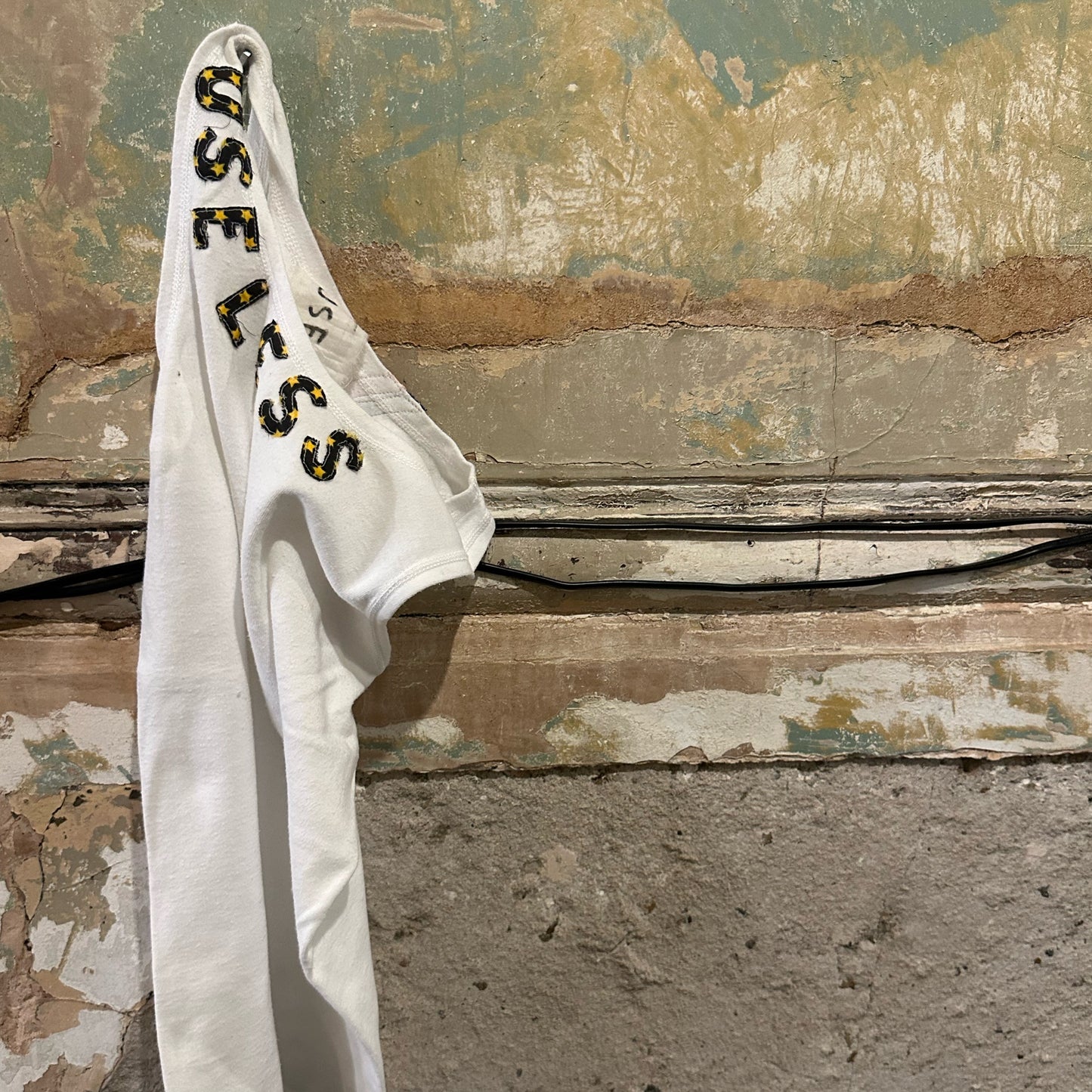 001. White Tank Appliqué Logo