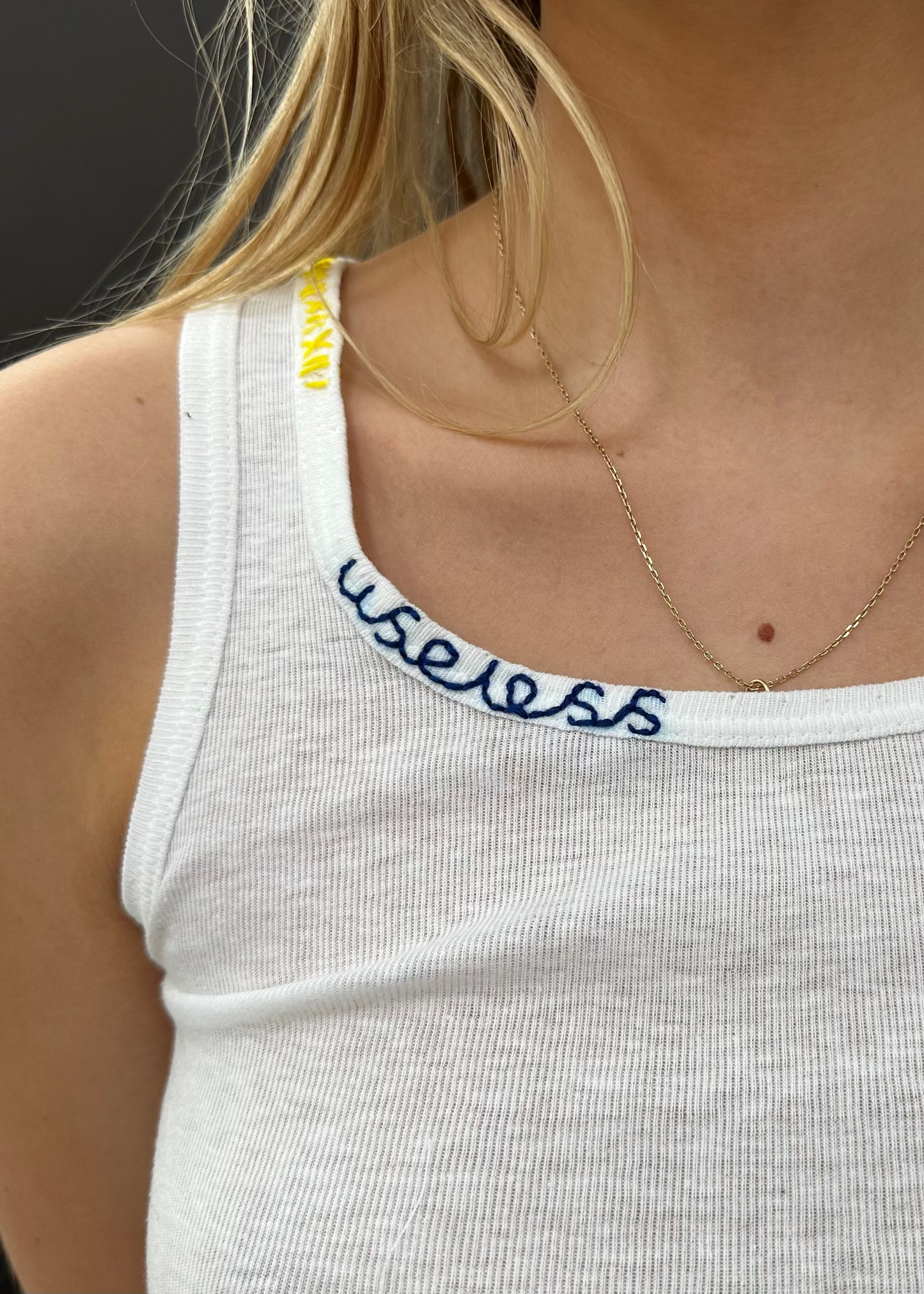 White Tank With Blue Stitch Logo