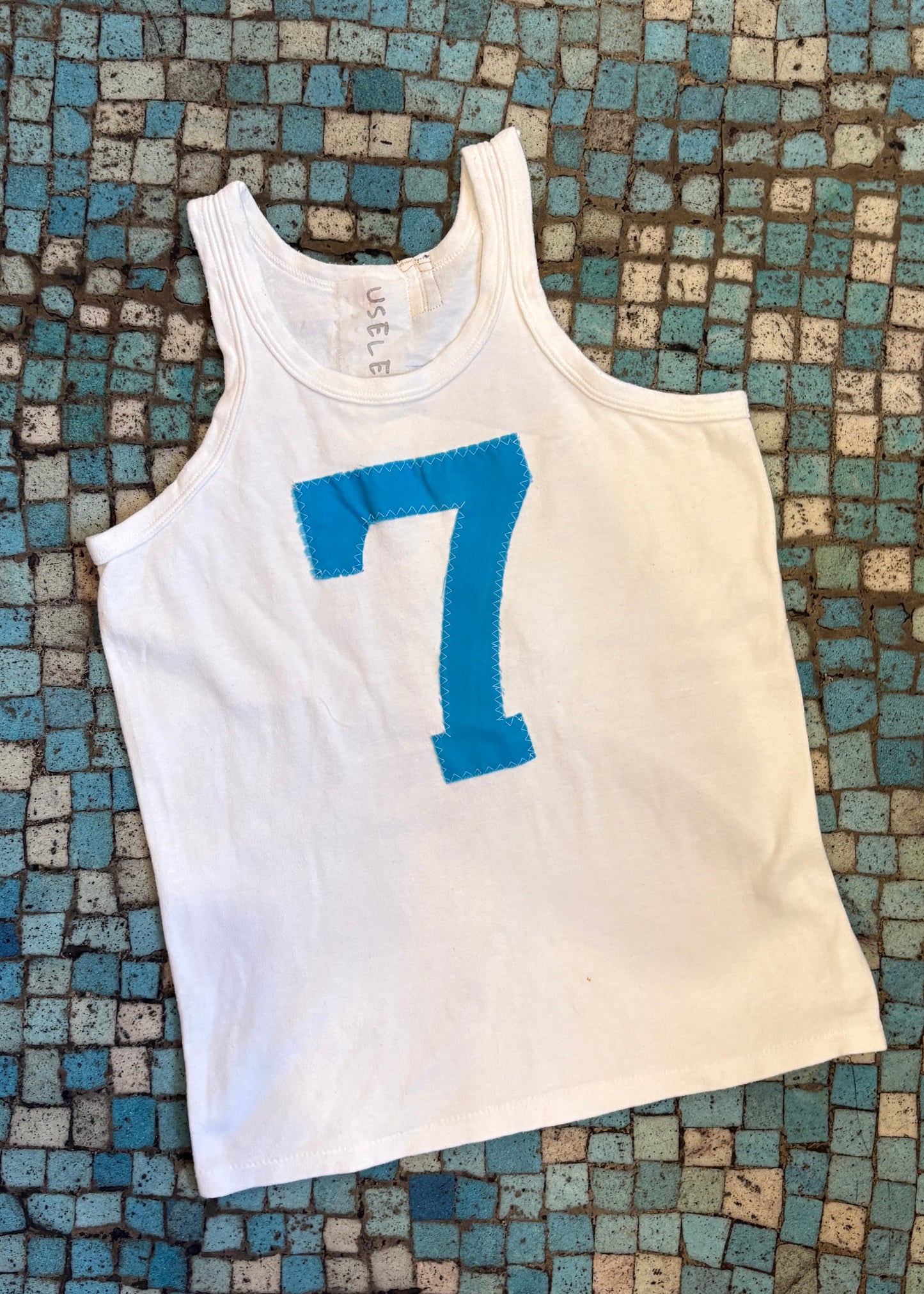019. "7" Tank Top