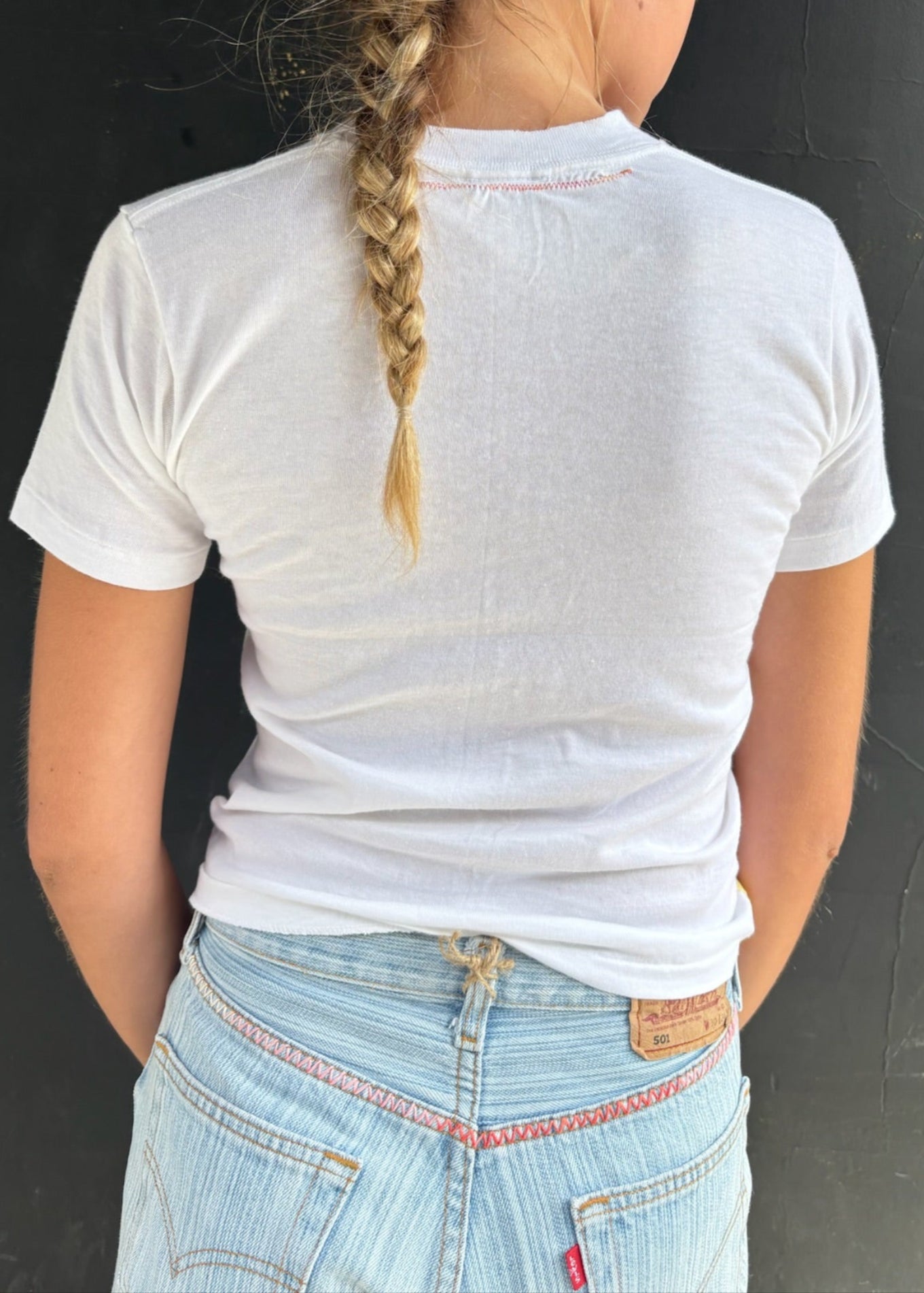 White T Shirt with Red and Yellow 'Useless Crap' Embroidery