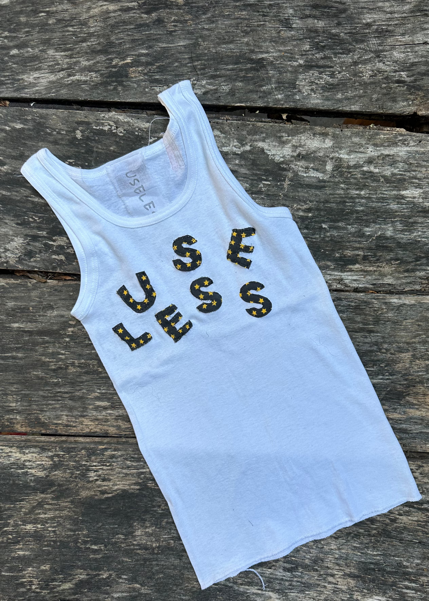 008. White Tank Appliqué Logo