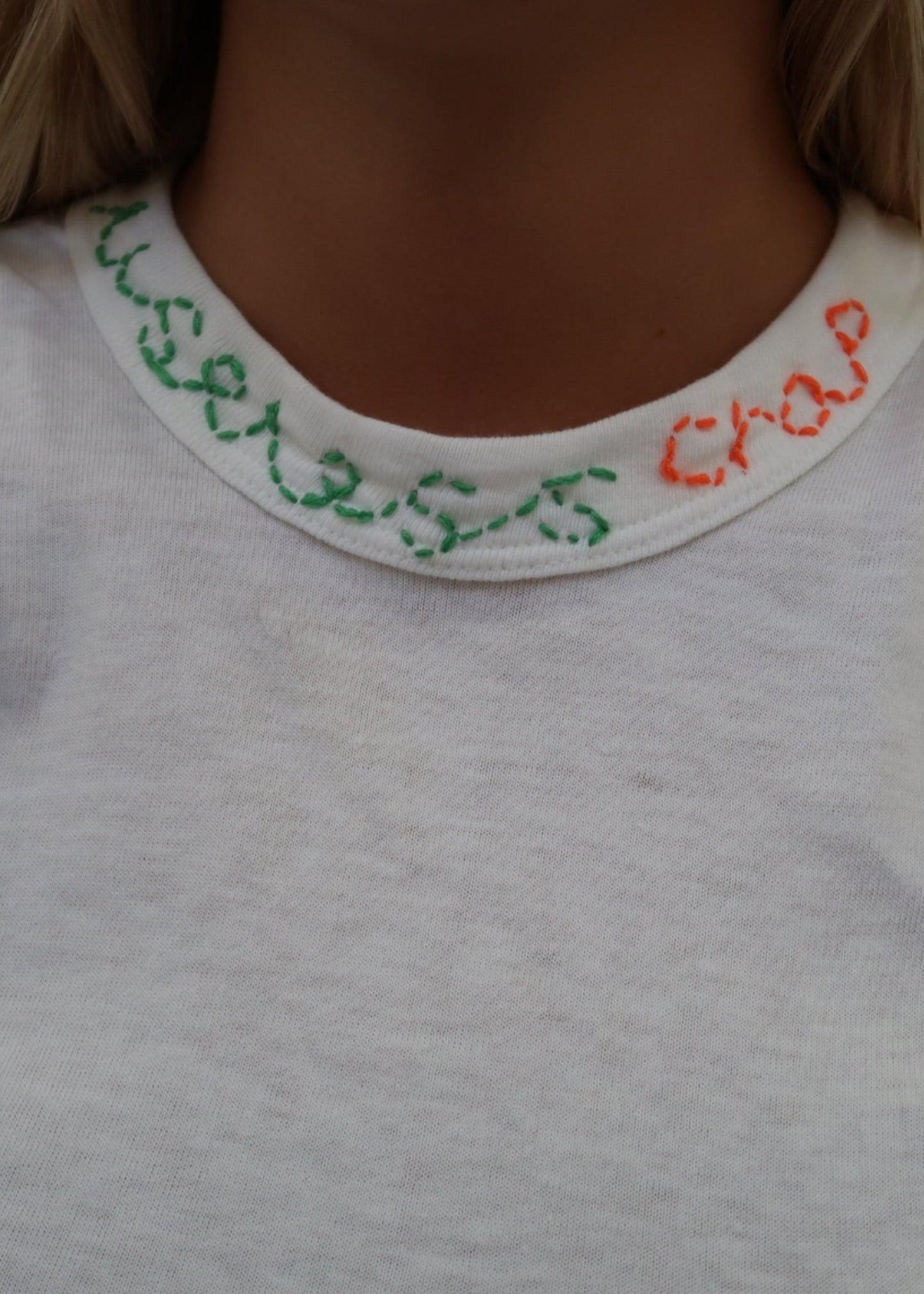 White T Shirt with Green and Orange Embroidery