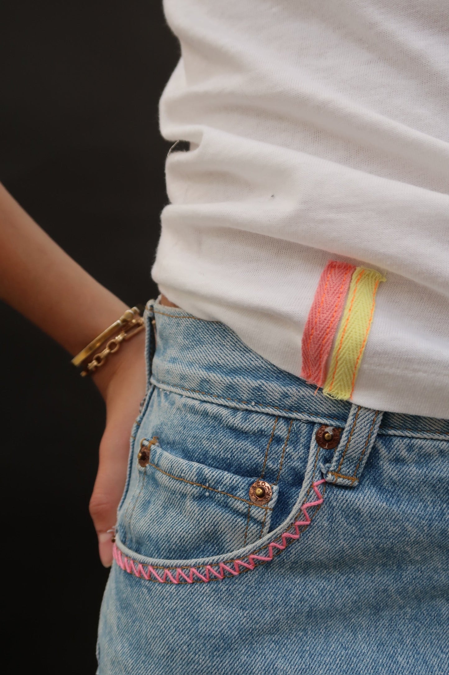 Levi's Light Wash Cut-Offs with Pink and Yellow Tabs